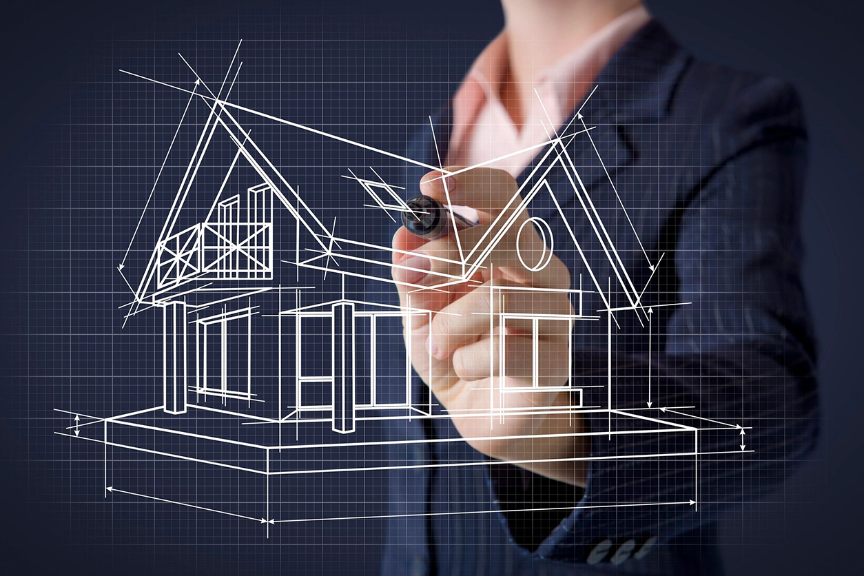 A man drawing a house on top of a screen.